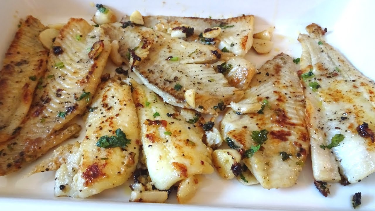 merluza al ajillo con vino blanco